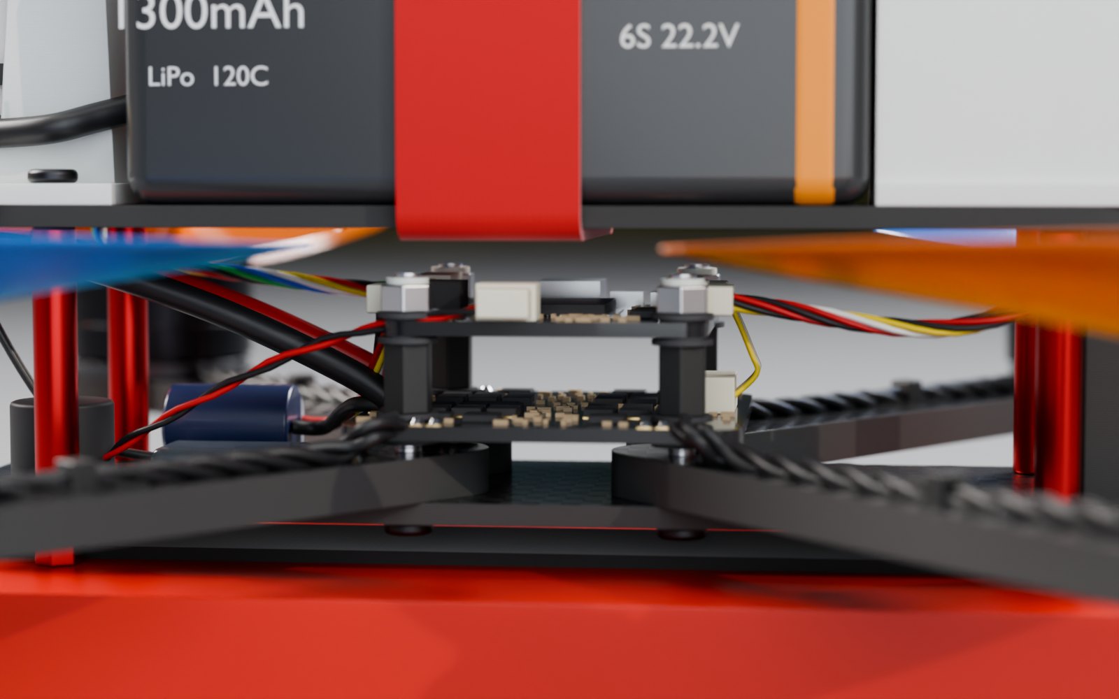 Close-up between the plates: flight controller on nylon spacers over the ESC, grommets, nyloc nuts, capacitor and wiring